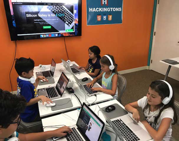 Girls coding side by side at Hackingtons Pleasant Hill