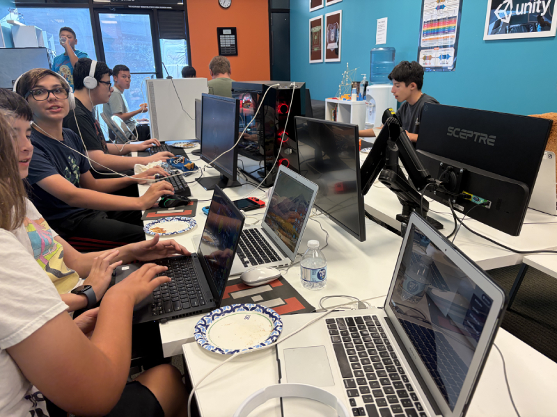 Students coding together at the Hackingtons Rocklin 12 year anniversary party