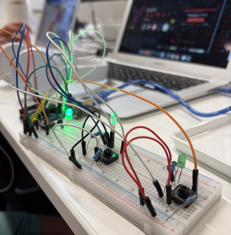 Arduino breadboard project with LEDs and buttons built by a Hackingtons student